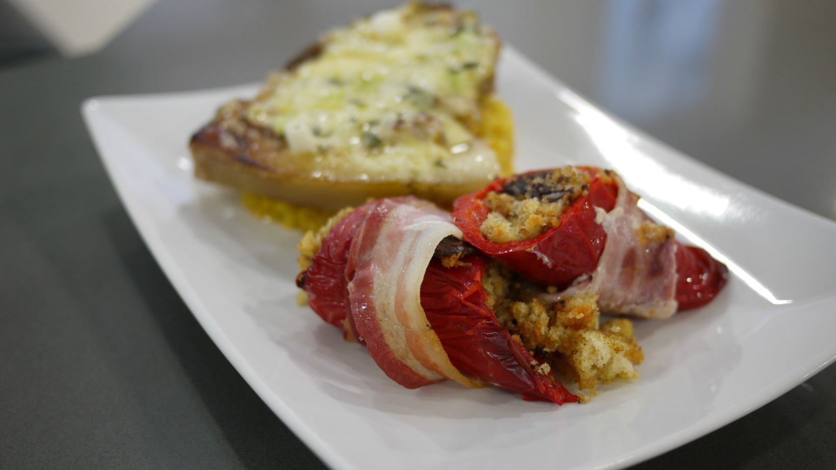 Beth's winning main course of Apple-glazed Cheese and Onion Pork Chops, Stuffed Cone Peppers and Paella